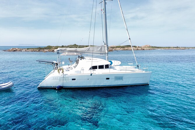 Private catamaran sailing trip around La Caletta -Berchida - Sardinia - What the skipper and the private setup change for you