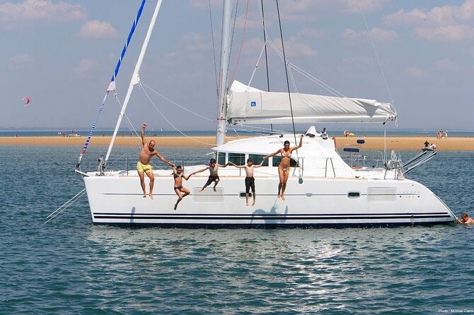 Private Catamaran Tour to the Maddalena Archipelago from Cannigione - Spargi snorkeling stop: turquoise water and white beaches