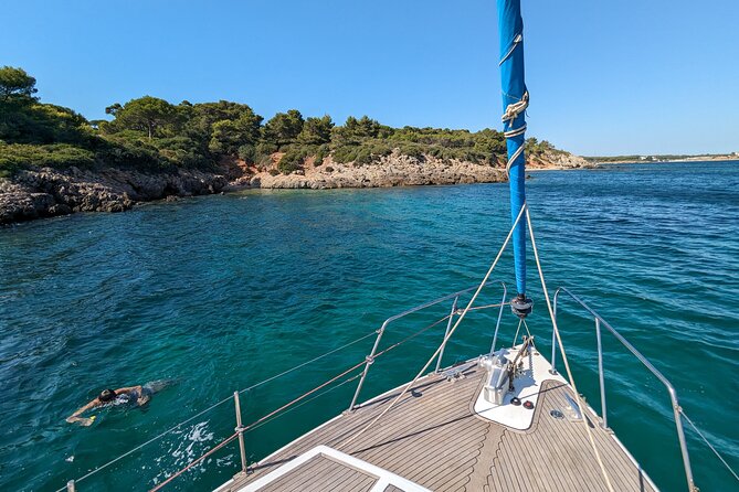 Sailing Experience to Capo Caccia from Alghero - Stop 2: Punta Giglio and Porto Conte Natural Park coast cruising