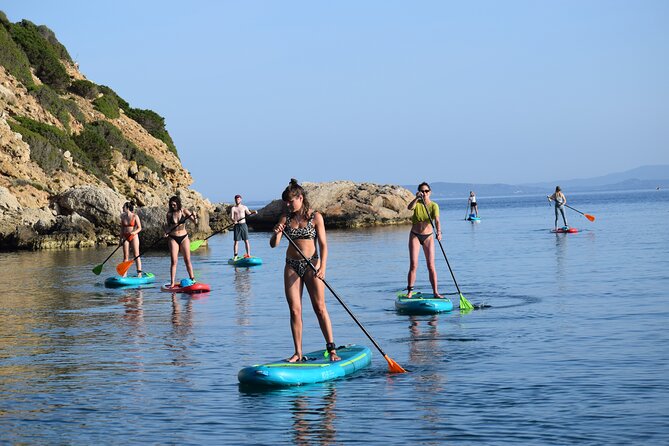 Stand Up Paddle With Dolphins, aperitif and pictures - Cala Moresca Swim Stop: When the Water Feels Like Vacation