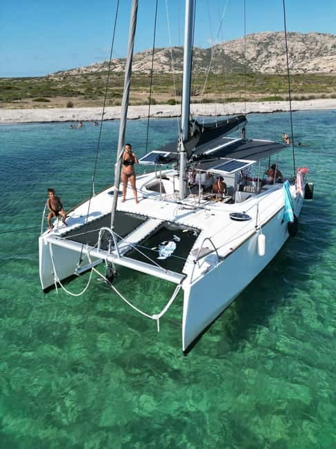 Stintino: full day tour catamaran Asinara Island - Aperitif on board: a quick Sardinian start that sets the tone