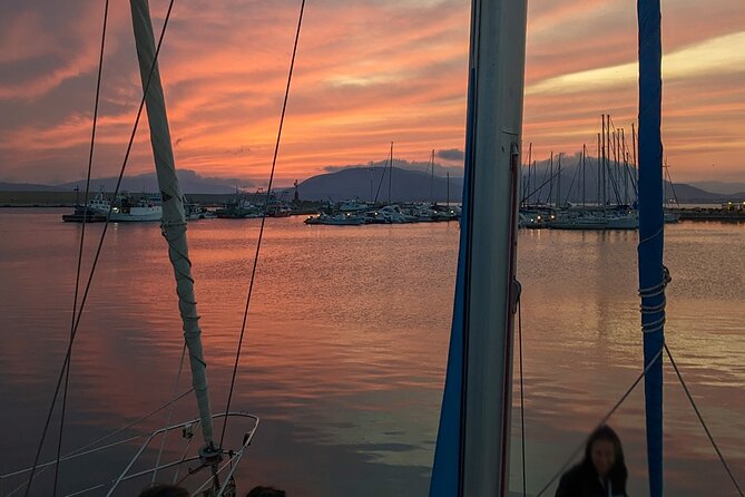 Sunset and Aperitif on a Sailing Boat in Alghero - Alghero’s fortifications from the sea: Catalan-Aragonese walls at golden hour