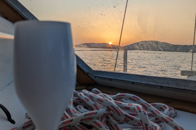 Sunset and Aperitif on a Sailing Boat in Alghero - What to expect on board: music, hosting style, and boat comfort