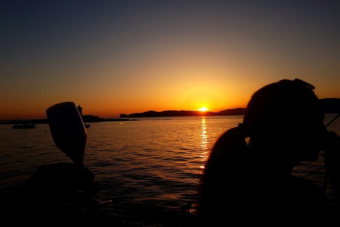 Sunset and Aperitif on a Sailing Boat in Alghero - Aperitif time: local wine, snacks, and music on the water