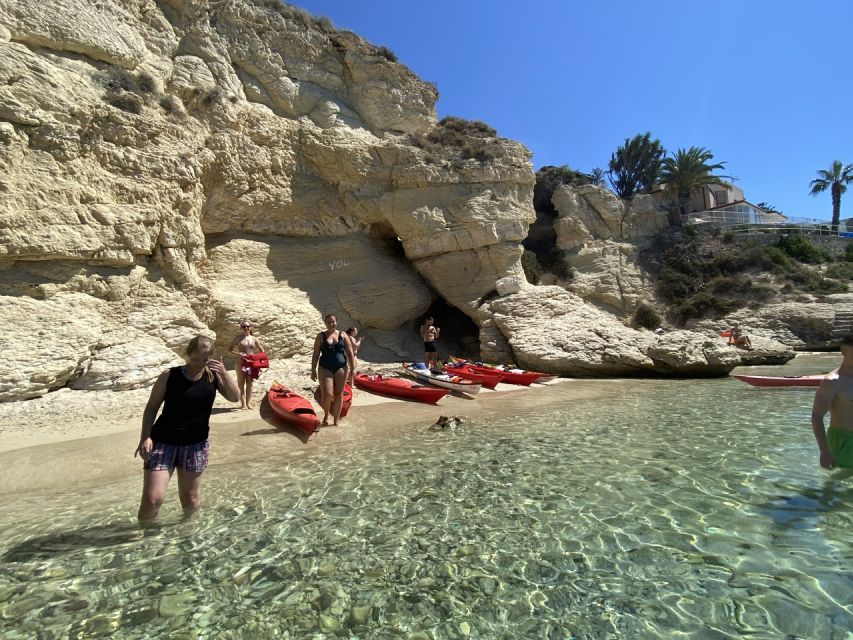 Sunset kayak tour Sella del diavolo - Poetto water time: swimming, snorkeling, and that dolphin-watching pause