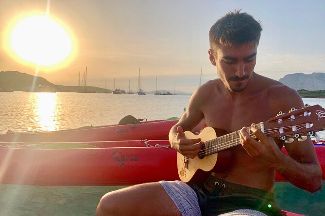Sunset Kayak Tour with Snorkeling and Local Aperitif - Mid-trip fun: rock jumping, music, and singing with the group