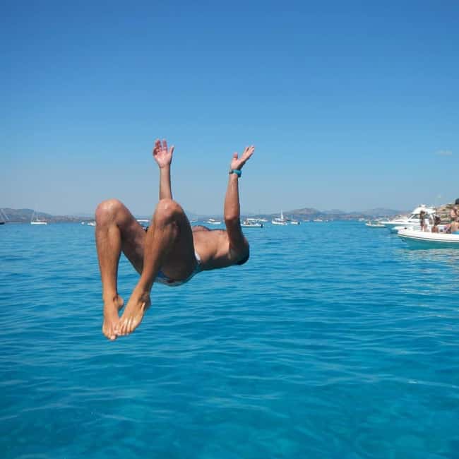 Tavolara: 5 Islands tour from San Teodoro's beach - Midday natural pools and cave drama: Ruia, Proratora, Molara