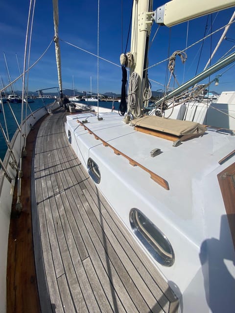 TAVOLARA TOUR WITH 15 METERS VINTAGE SAILBOAT WITH APERITIF - Isola Cavalli and the other swim breaks: short sails, long views