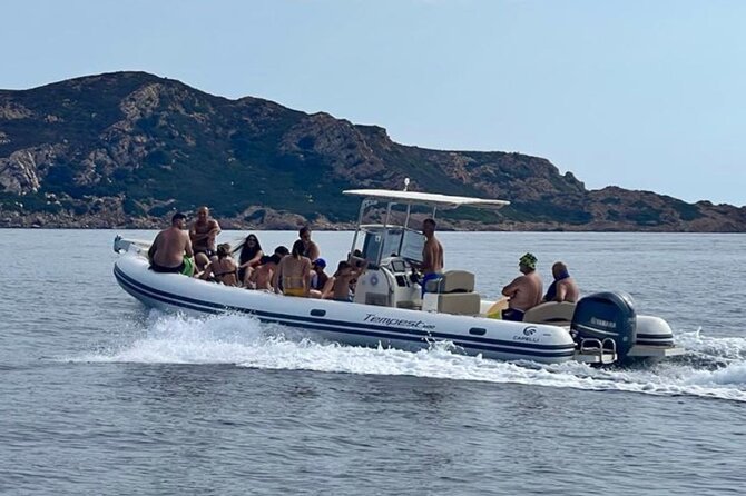 Villasimius: dinghy tour - Stop 2: Spiaggia di Punta Molentis and its calm cliff-and-scrub setting